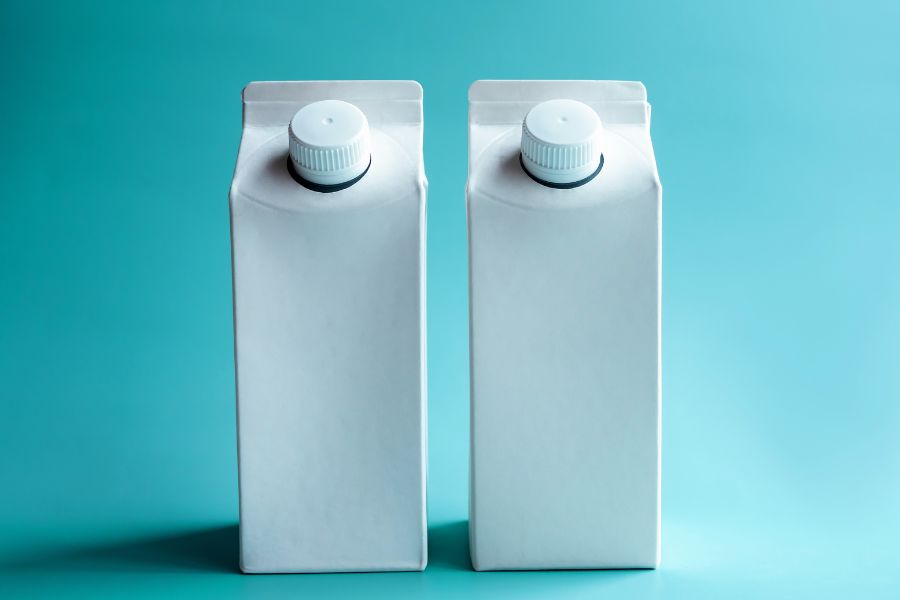 Paperboard cartons suitable for liquids and sauces