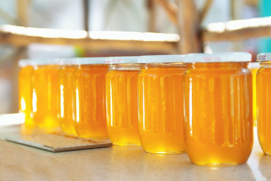 Honey packaged in glass jars 