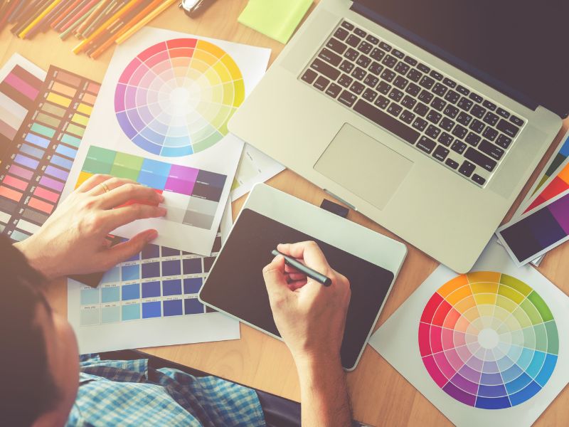 graphic designer working on branding for custom packaging