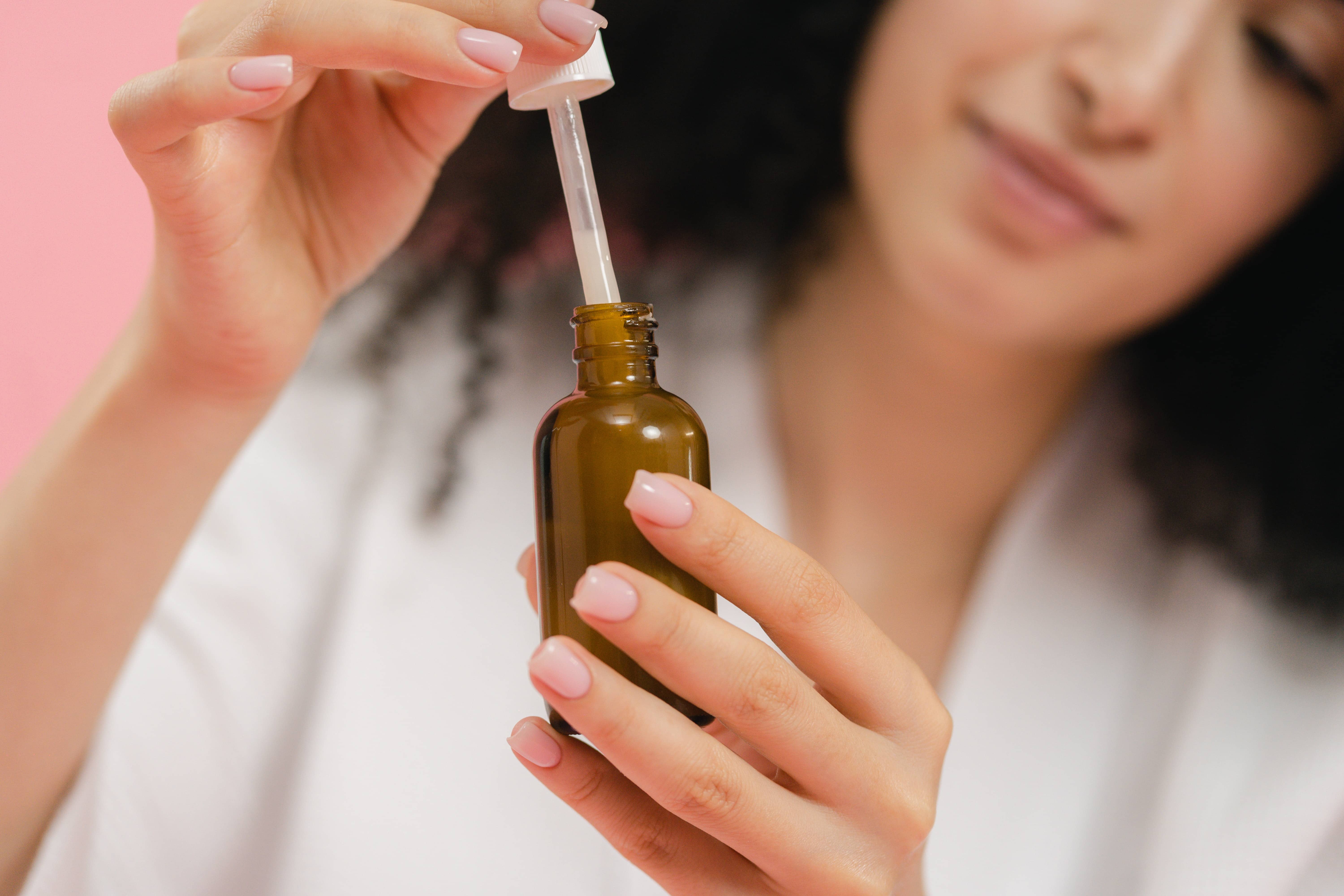 woman using a dispensing closure