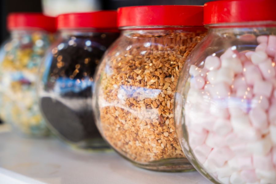 various food items stored in recyclable plastic jars