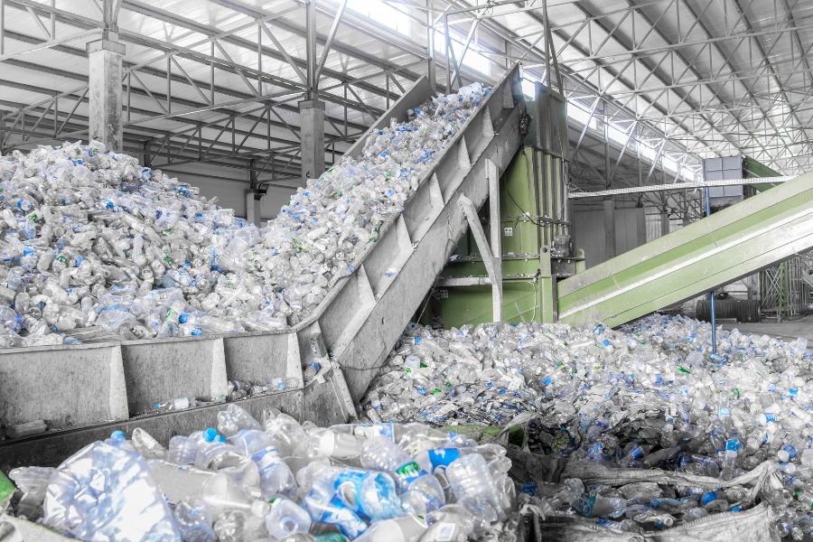 plastics going through recycling process at facility