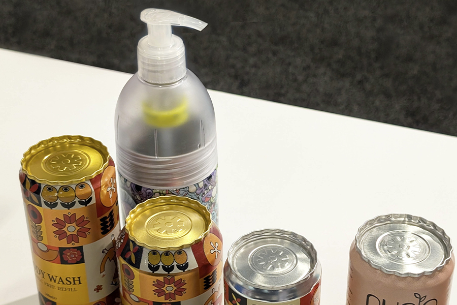 Metal dispensing bottle with refillable cans seen at Cosmoprof 2025