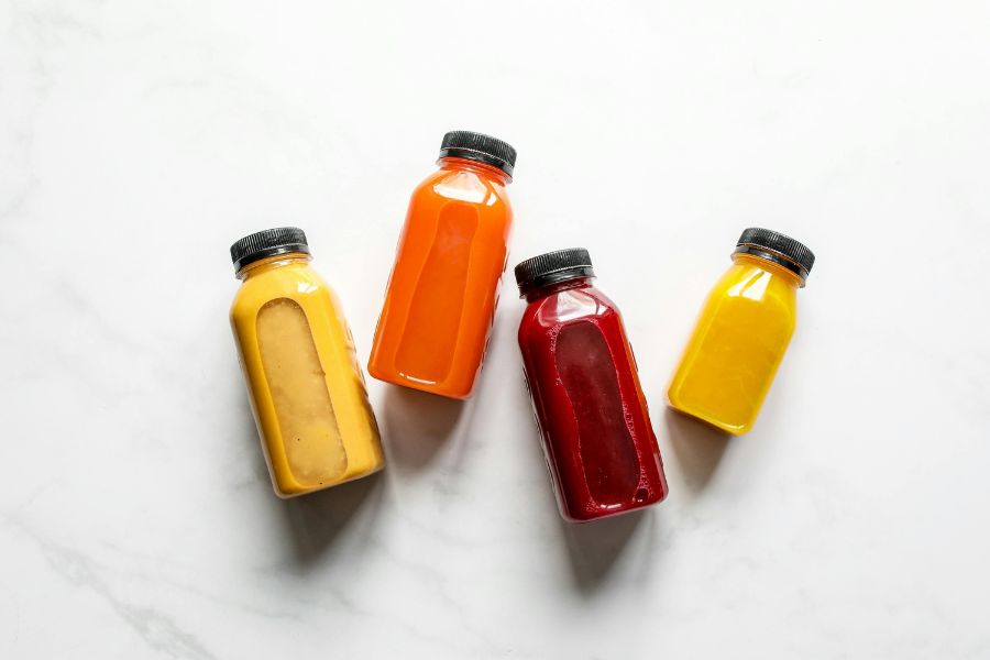 juices in plastic beverage packaging on white background