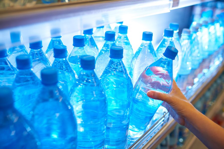 Water bottle beverage packaging on retail shelves