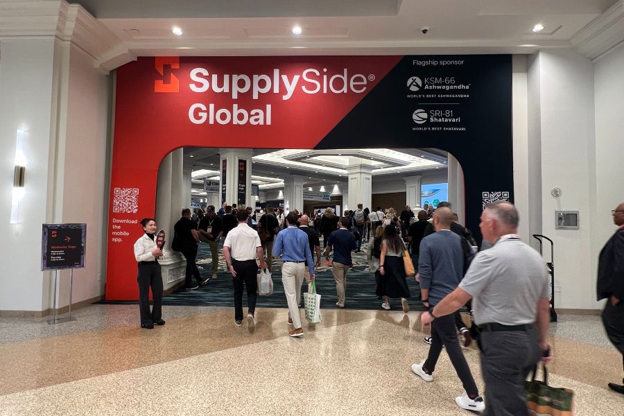 Attendees enter the SupplySide Global expo hall