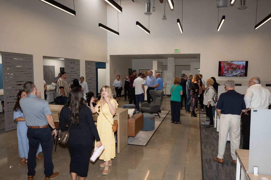 Guests mingle inside Paramount offices at 50 year party