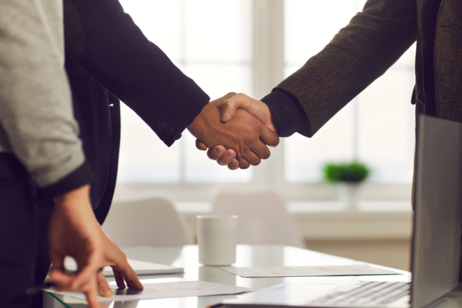 business partners shaking hands