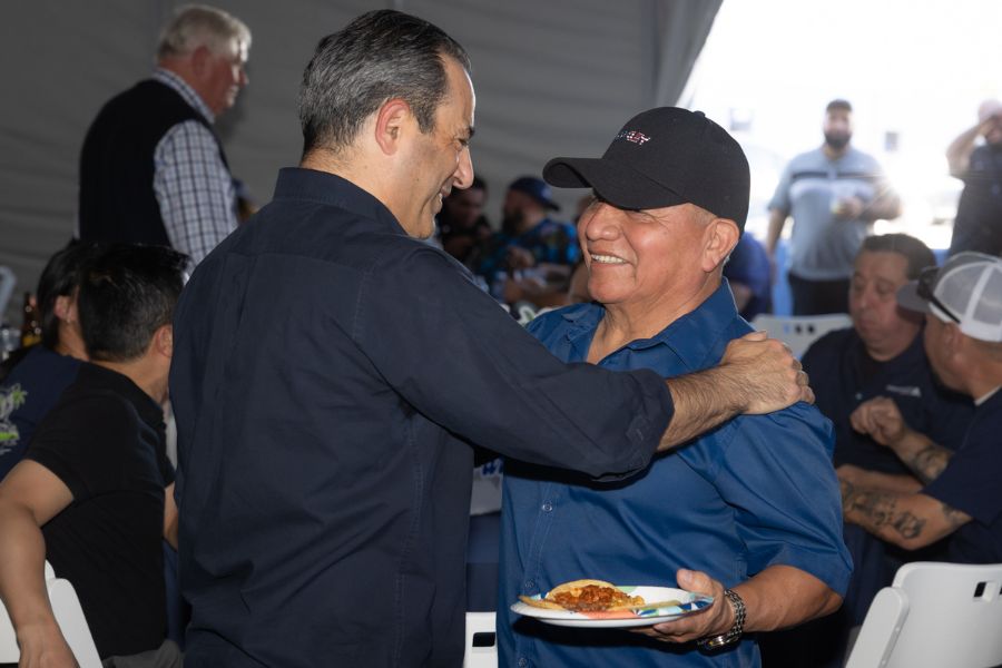 Jay embraces retired long-time employee at 50 year party